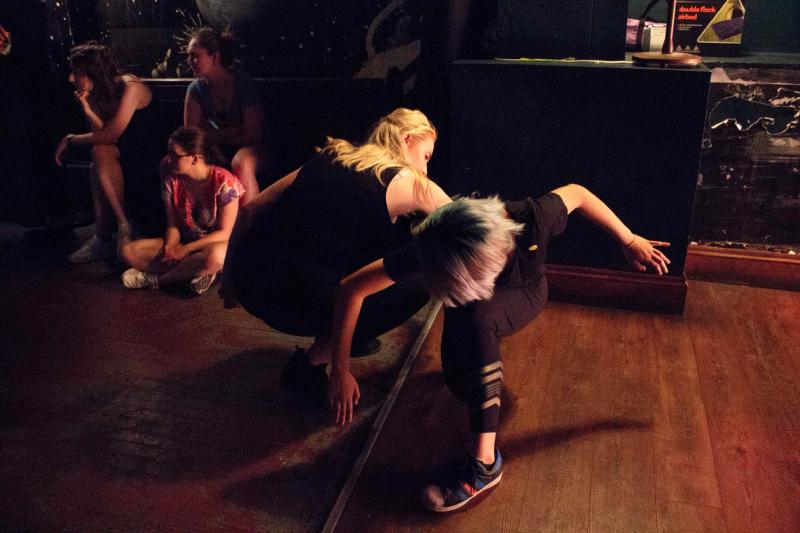 Two actors dancing amongst audience in 'Nothing'