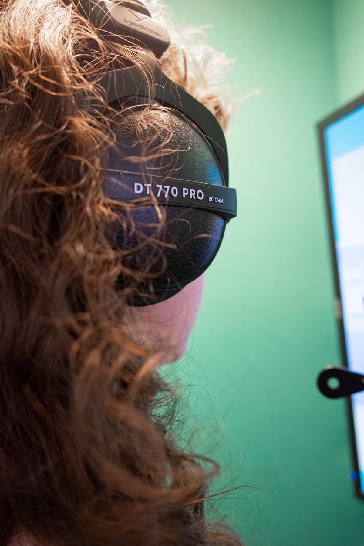 Rae Emily George wearing Beyerdynamics DT770 Pro headphones